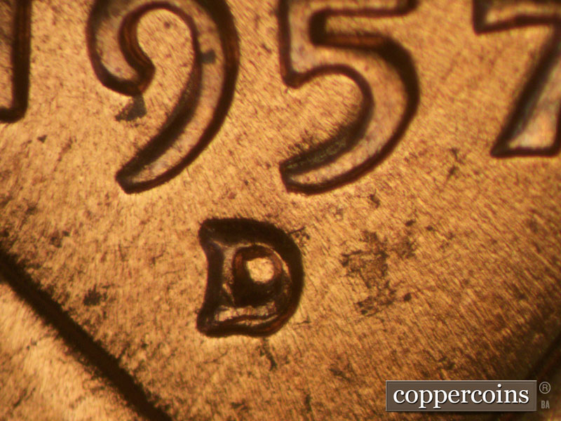 Die-stage B marker on 1957D•1MM•006 (1957 Repunched Mint Mark).