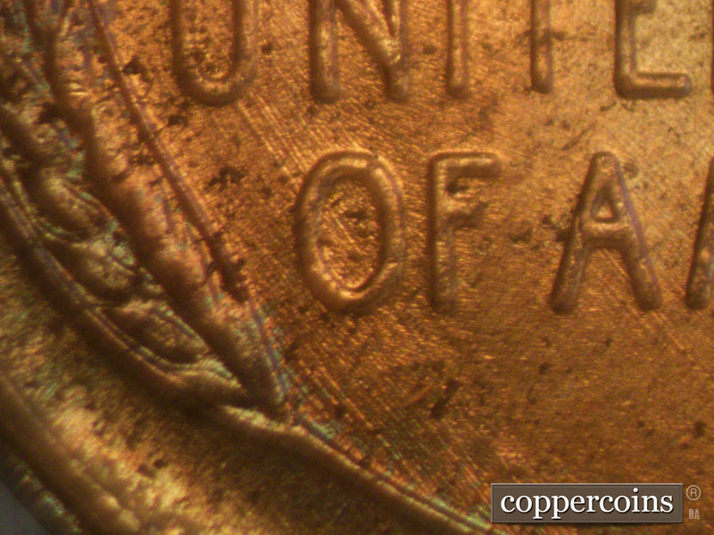 Die-stage B marker on 1957D•1MM•006 (1957 Repunched Mint Mark).