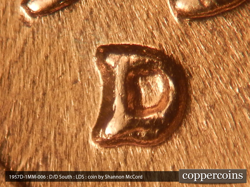 Die-stage C marker on 1957D•1MM•006 (1957 Repunched Mint Mark).