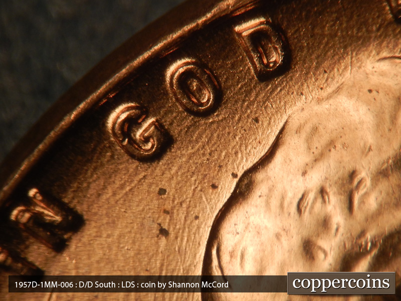 Die-stage C marker on 1957D•1MM•006 (1957 Repunched Mint Mark).
