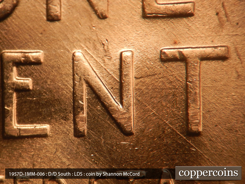 Die-stage C marker on 1957D•1MM•006 (1957 Repunched Mint Mark).