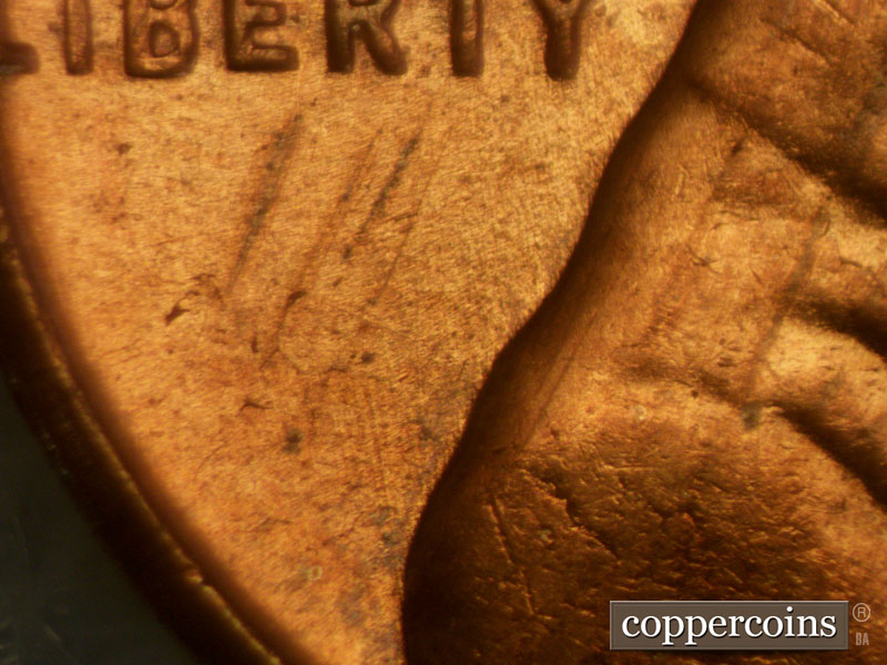 Die-stage A marker on 1957D•1MM•007 (1957 Repunched Mint Mark).