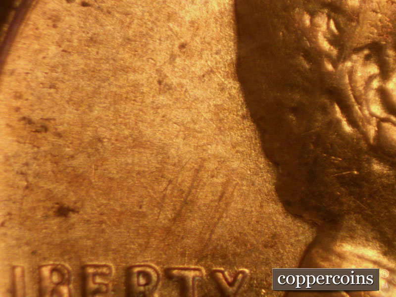 Die-stage A marker on 1957D•1MM•007 (1957 Repunched Mint Mark).