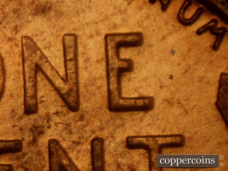 Die-stage A marker on 1957D•1MM•007 (1957 Repunched Mint Mark).
