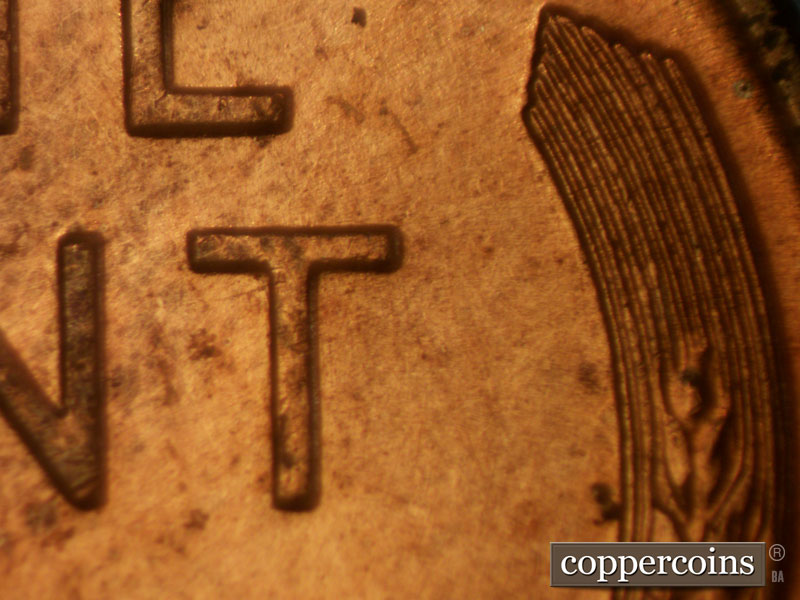 Die-stage A marker on 1957D•1MM•007 (1957 Repunched Mint Mark).