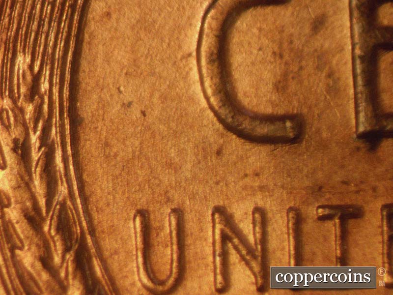 Die-stage A marker on 1957D•1MM•007 (1957 Repunched Mint Mark).
