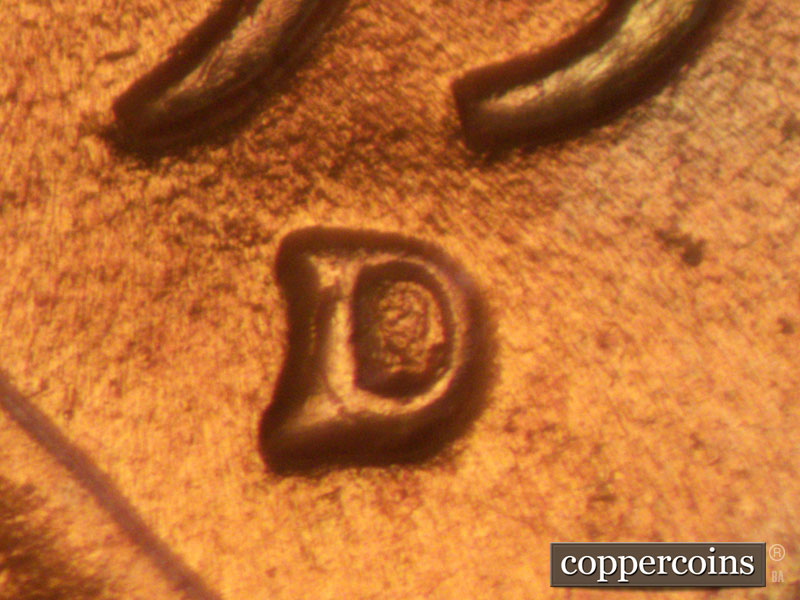 Die-stage A marker on 1957D•1MM•008 (1957 Repunched Mint Mark).