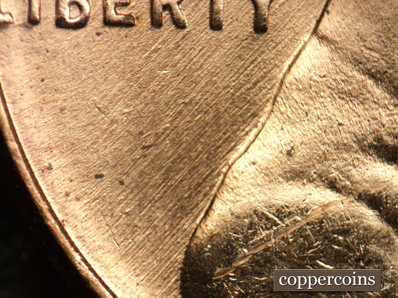 Die-stage C marker on 1957D•1MM•008 (1957 Repunched Mint Mark).