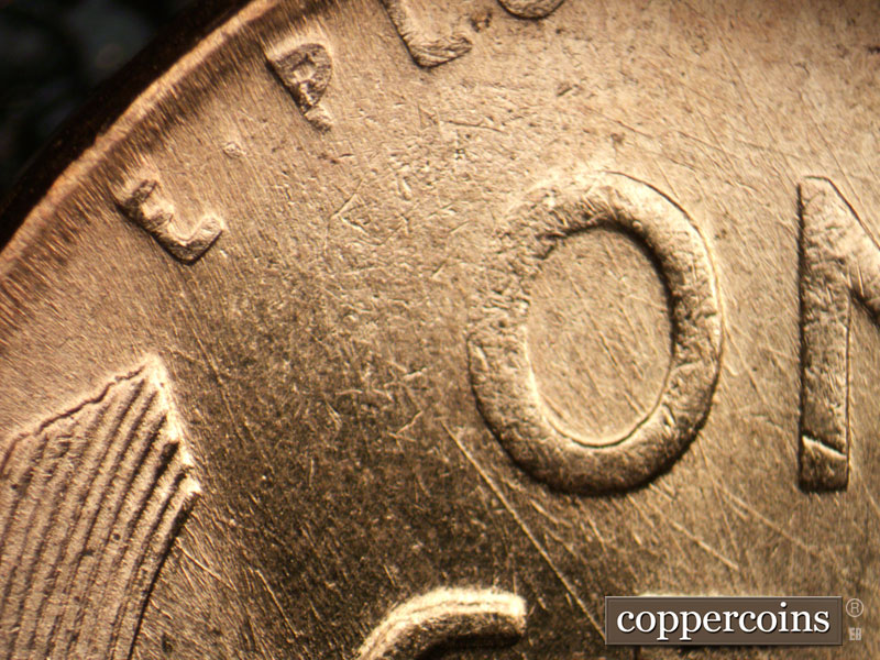 Die-stage C marker on 1957D•1MM•008 (1957 Repunched Mint Mark).