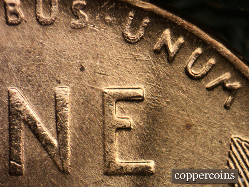 Die-stage C marker on 1957D•1MM•008 (1957 Repunched Mint Mark).