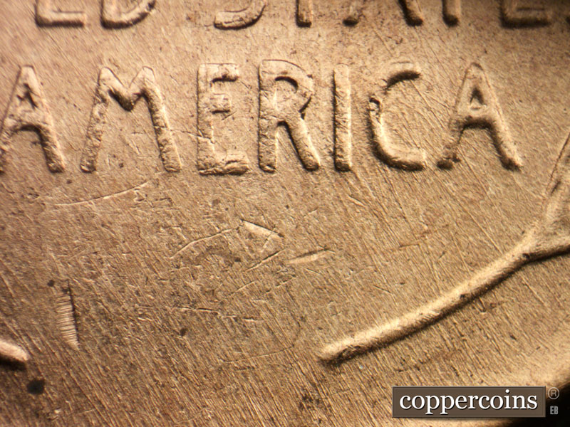 Die-stage C marker on 1957D•1MM•008 (1957 Repunched Mint Mark).