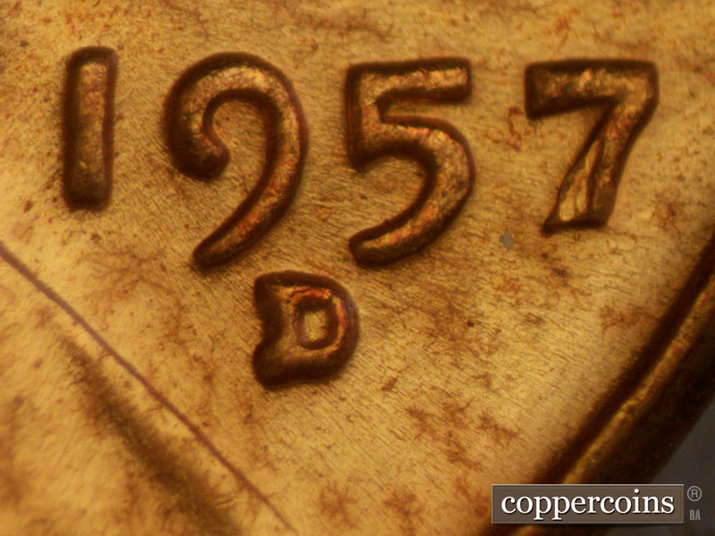 Die-stage B marker on 1957D•1MM•009 (1957 Repunched Mint Mark).