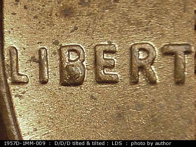 Die-stage C marker on 1957D•1MM•009 (1957 Repunched Mint Mark).
