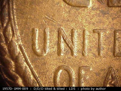 Die-stage C marker on 1957D•1MM•009 (1957 Repunched Mint Mark).