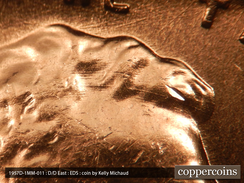 Die-stage A marker on 1957D•1MM•011 (1957 Repunched Mint Mark).