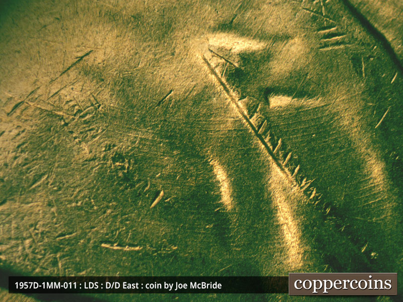 Die-stage C marker on 1957D•1MM•011 (1957 Repunched Mint Mark).