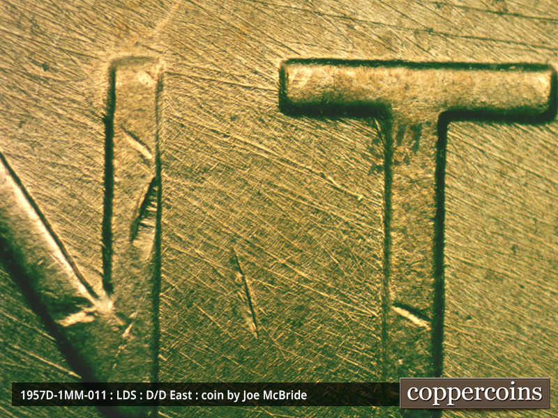Die-stage C marker on 1957D•1MM•011 (1957 Repunched Mint Mark).