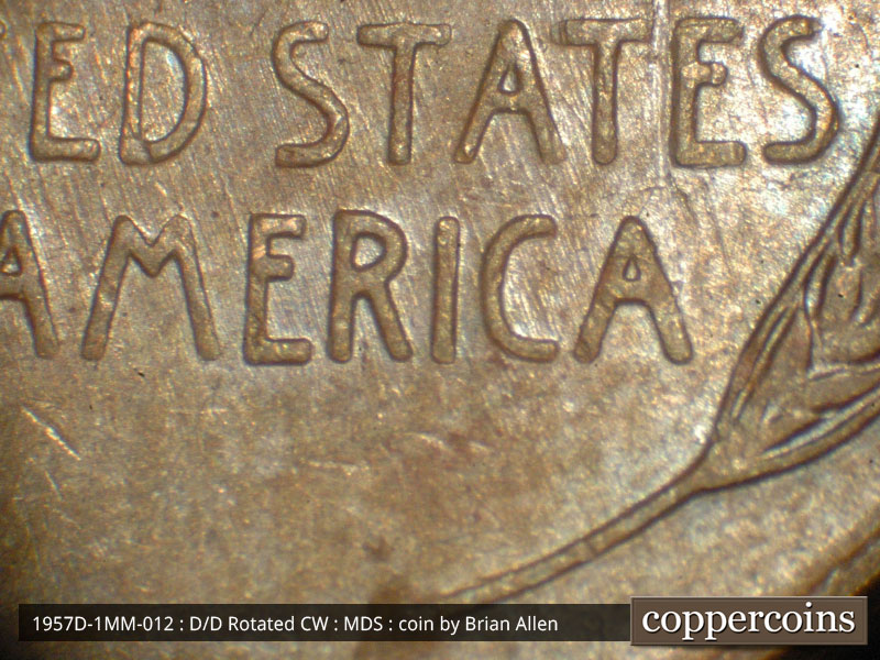 Die-stage B marker on 1957D•1MM•012 (1957 Repunched Mint Mark).