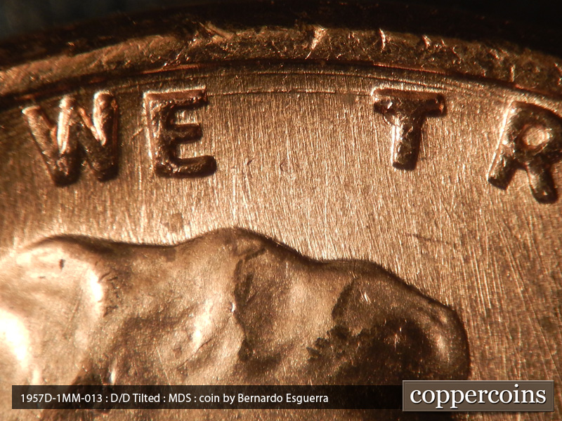 Die-stage B marker on 1957D•1MM•013 (1957 Repunched Mint Mark).