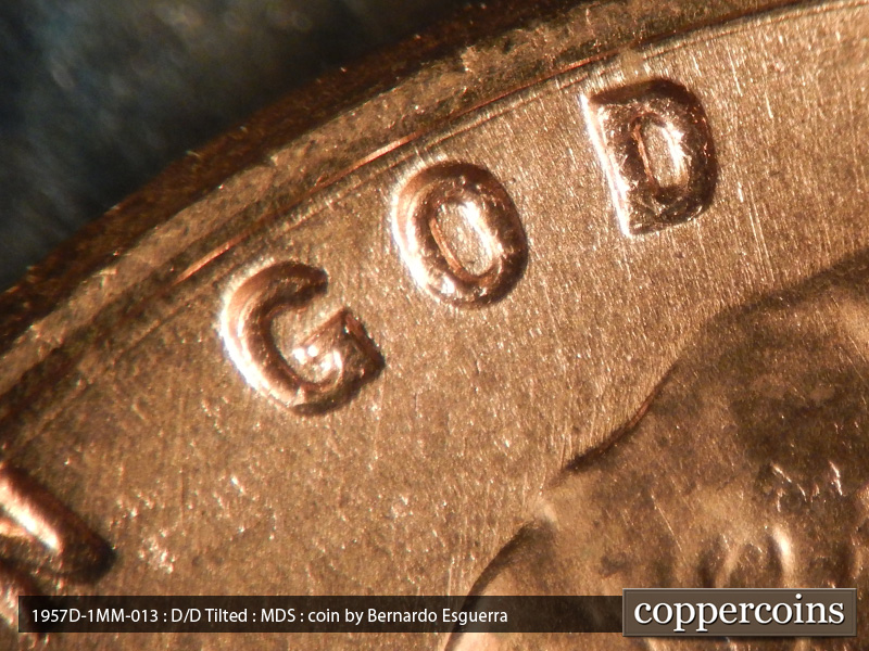Die-stage B marker on 1957D•1MM•013 (1957 Repunched Mint Mark).