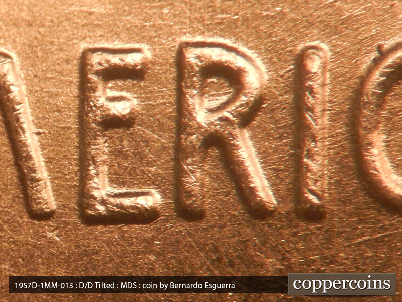 Die-stage B marker on 1957D•1MM•013 (1957 Repunched Mint Mark).