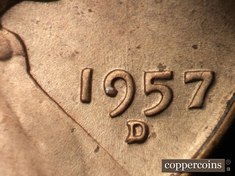 Die-stage B marker on 1957D•1MM•014 (1957 Repunched Mint Mark).
