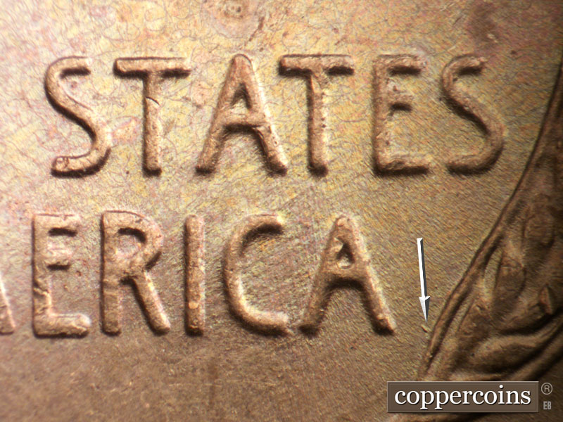 Die-stage B marker on 1957D•1MM•014 (1957 Repunched Mint Mark).