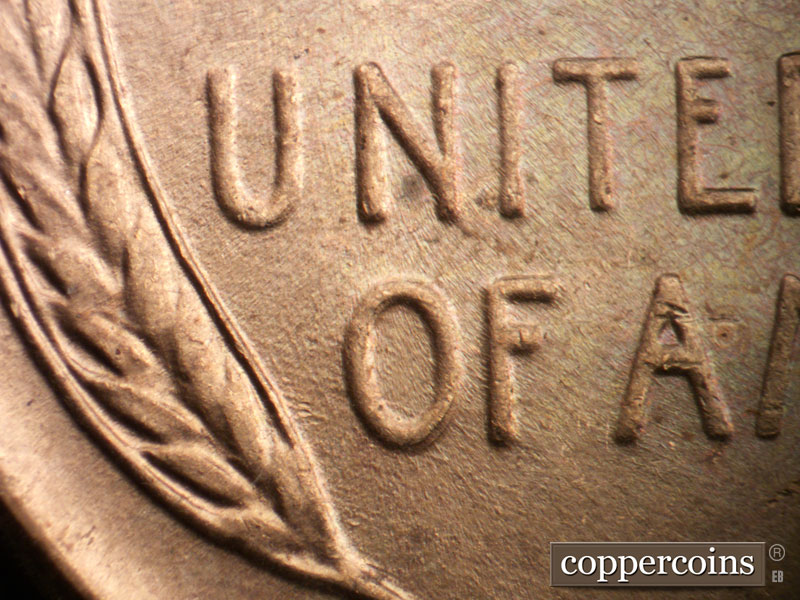 Die-stage B marker on 1957D•1MM•014 (1957 Repunched Mint Mark).
