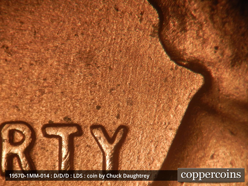Die-stage C marker on 1957D•1MM•014 (1957 Repunched Mint Mark).
