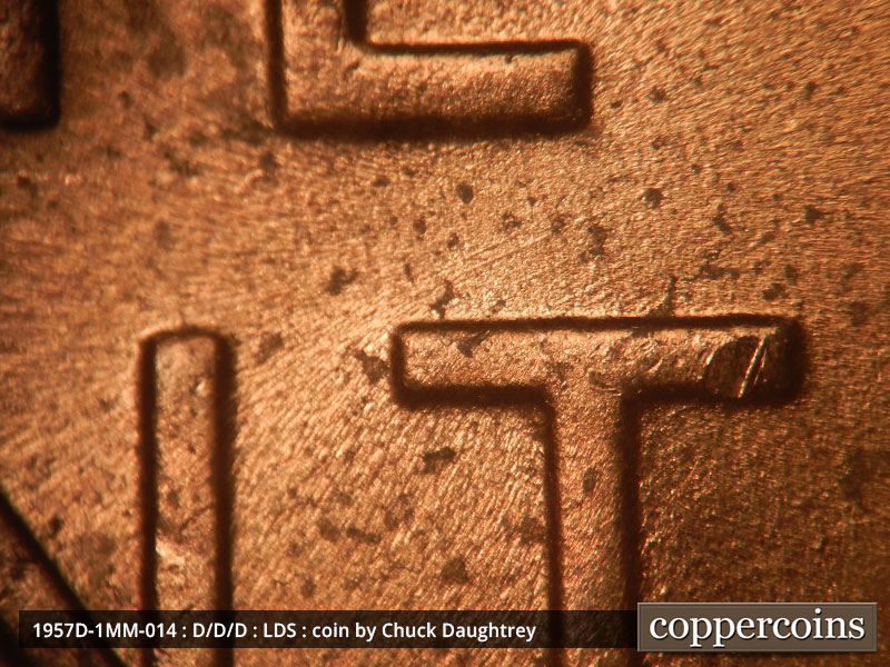 Die-stage C marker on 1957D•1MM•014 (1957 Repunched Mint Mark).