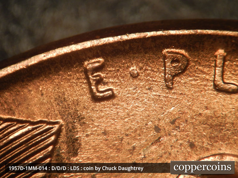 Die-stage C marker on 1957D•1MM•014 (1957 Repunched Mint Mark).