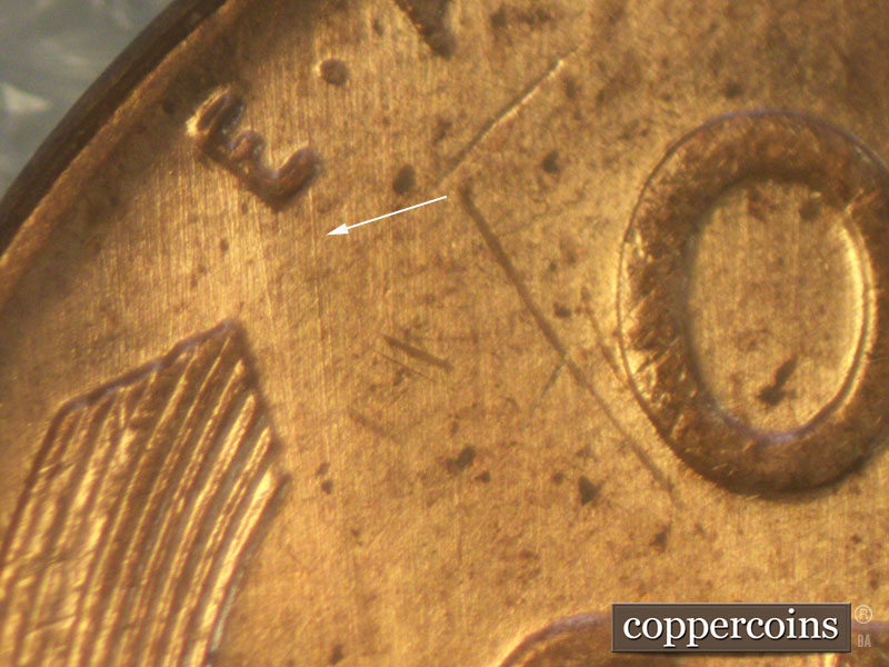 Die-stage A marker on 1957D•1MM•015 (1957 Repunched Mint Mark).