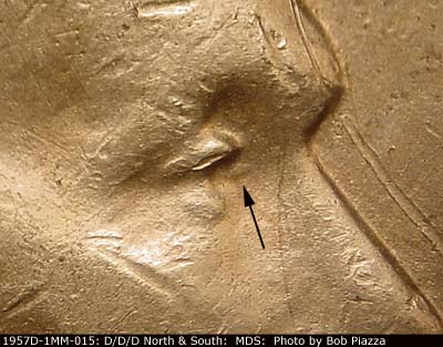 Die-stage B marker on 1957D•1MM•015 (1957 Repunched Mint Mark).