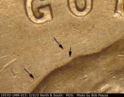 Die-stage B marker on 1957D•1MM•015 (1957 Repunched Mint Mark).