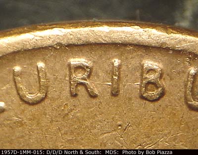 Die-stage B marker on 1957D•1MM•015 (1957 Repunched Mint Mark).