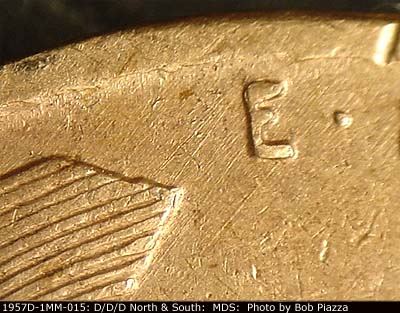 Die-stage B marker on 1957D•1MM•015 (1957 Repunched Mint Mark).