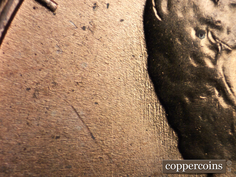 Die-stage A marker on 1957D•1MM•016 (1957 Repunched Mint Mark).