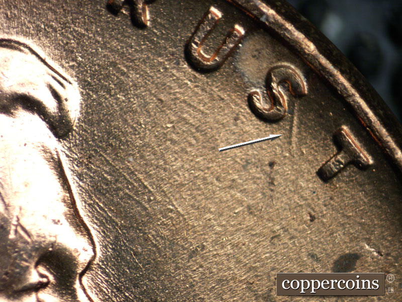 Die-stage A marker on 1957D•1MM•016 (1957 Repunched Mint Mark).