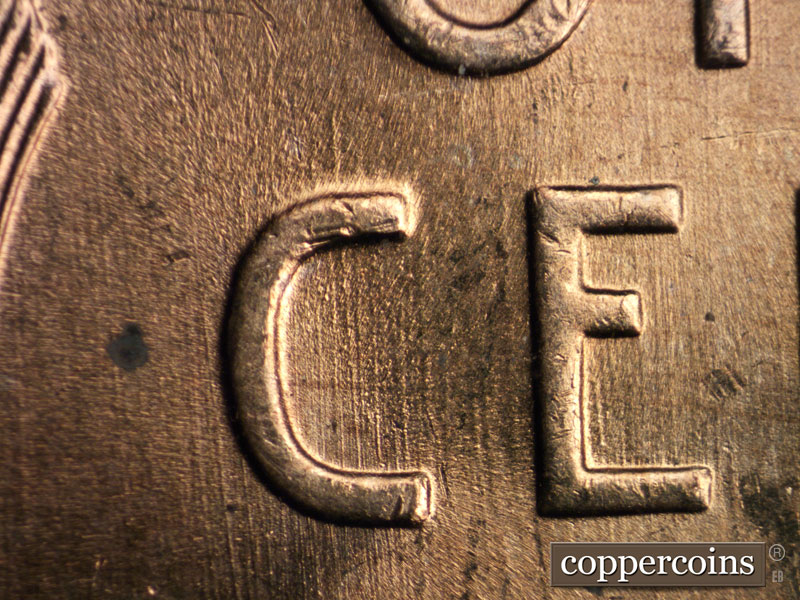 Die-stage A marker on 1957D•1MM•016 (1957 Repunched Mint Mark).