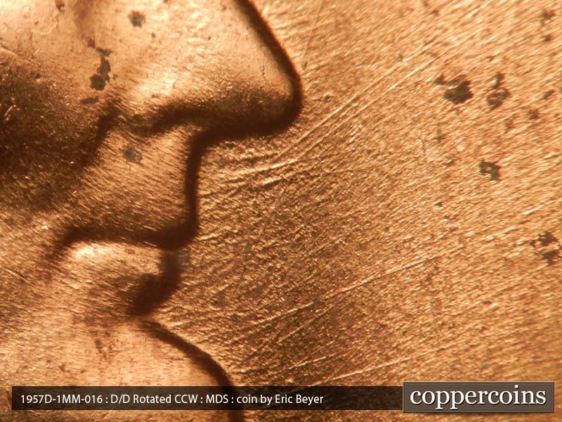 Die-stage B marker on 1957D•1MM•016 (1957 Repunched Mint Mark).