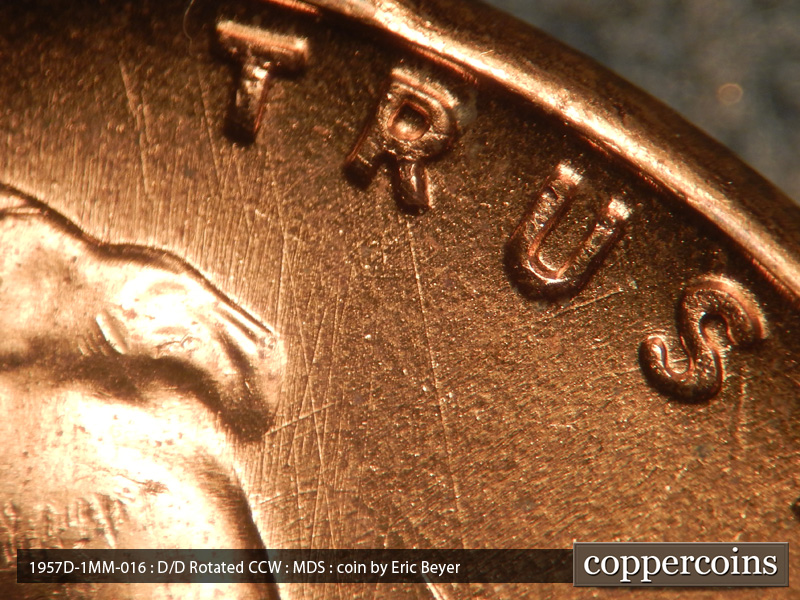 Die-stage B marker on 1957D•1MM•016 (1957 Repunched Mint Mark).