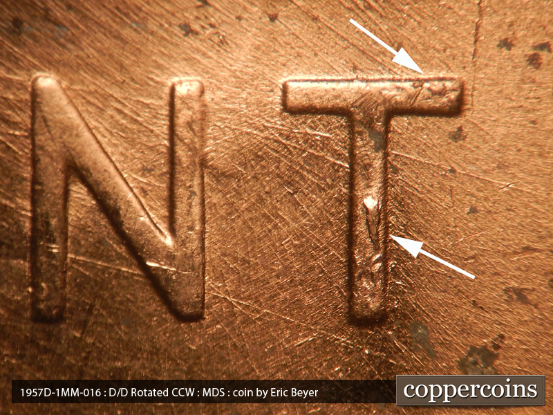 Die-stage B marker on 1957D•1MM•016 (1957 Repunched Mint Mark).