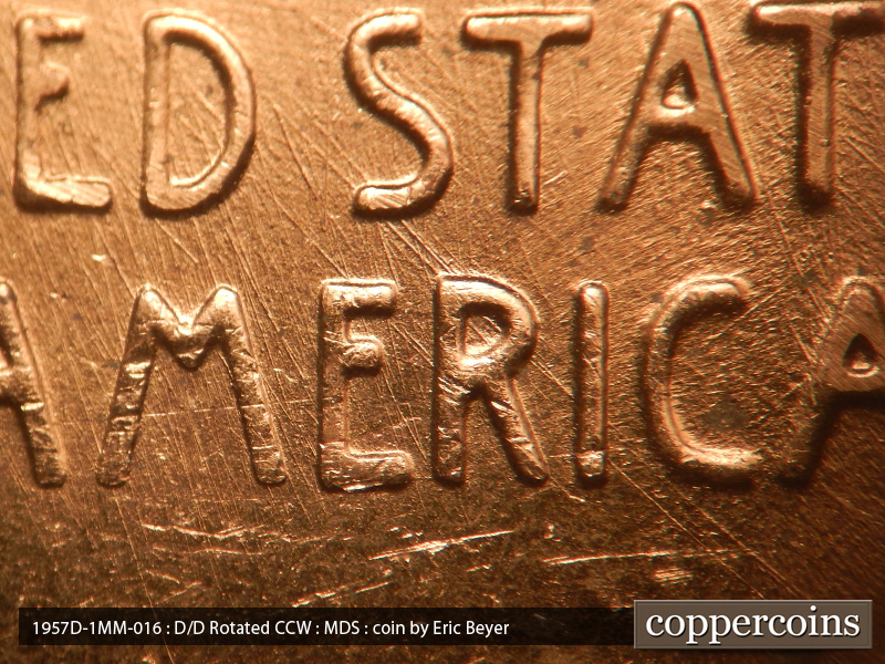 Die-stage B marker on 1957D•1MM•016 (1957 Repunched Mint Mark).