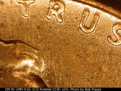 Die-stage C marker on 1957D•1MM•016 (1957 Repunched Mint Mark).