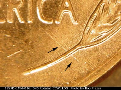 Die-stage C marker on 1957D•1MM•016 (1957 Repunched Mint Mark).