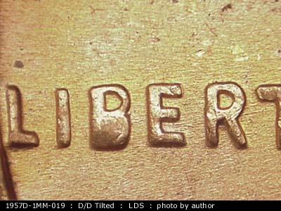 Die-stage C marker on 1957D•1MM•019 (1957 Repunched Mint Mark).