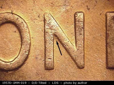 Die-stage C marker on 1957D•1MM•019 (1957 Repunched Mint Mark).
