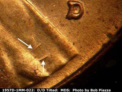Die-stage B marker on 1957D•1MM•022 (1957 Repunched Mint Mark).