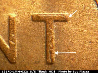 Die-stage B marker on 1957D•1MM•022 (1957 Repunched Mint Mark).