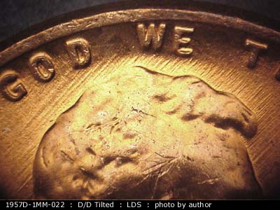 Die-stage C marker on 1957D•1MM•022 (1957 Repunched Mint Mark).